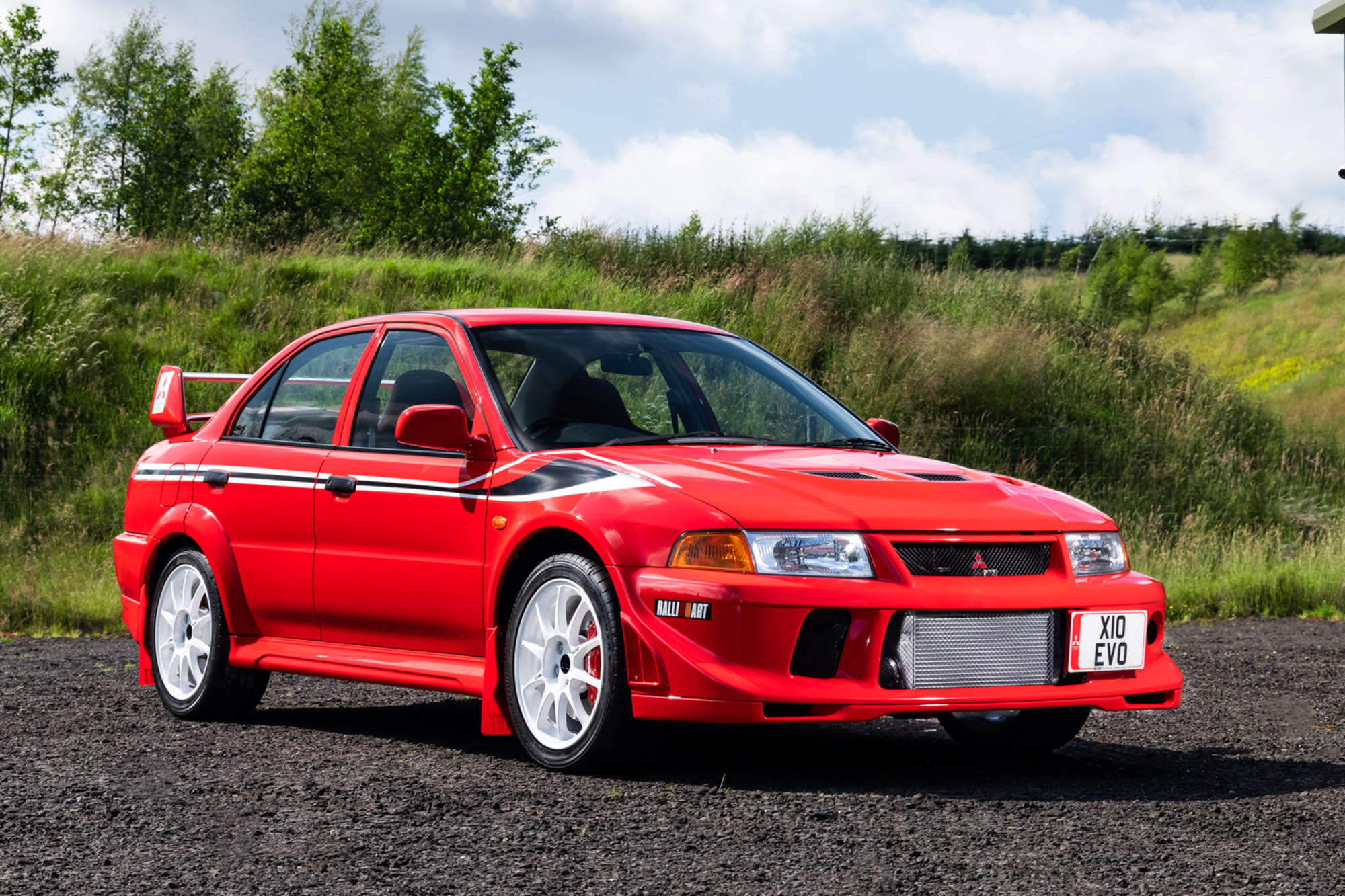 Mitsubishi evolution. Mitsubishi Lancer Evolution Tommi Makinen Edition. Митсубиси Лансер Эволюшн 2000. Mitsubishi Lancer EVO vi Tommi Makinen Edition. Mitsubishi Lancer EVO 6 Tommi Makinen Edition.